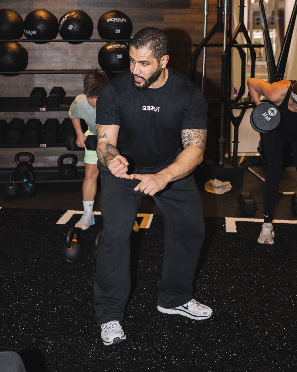 An independent trainer working with their own client on the private floor.