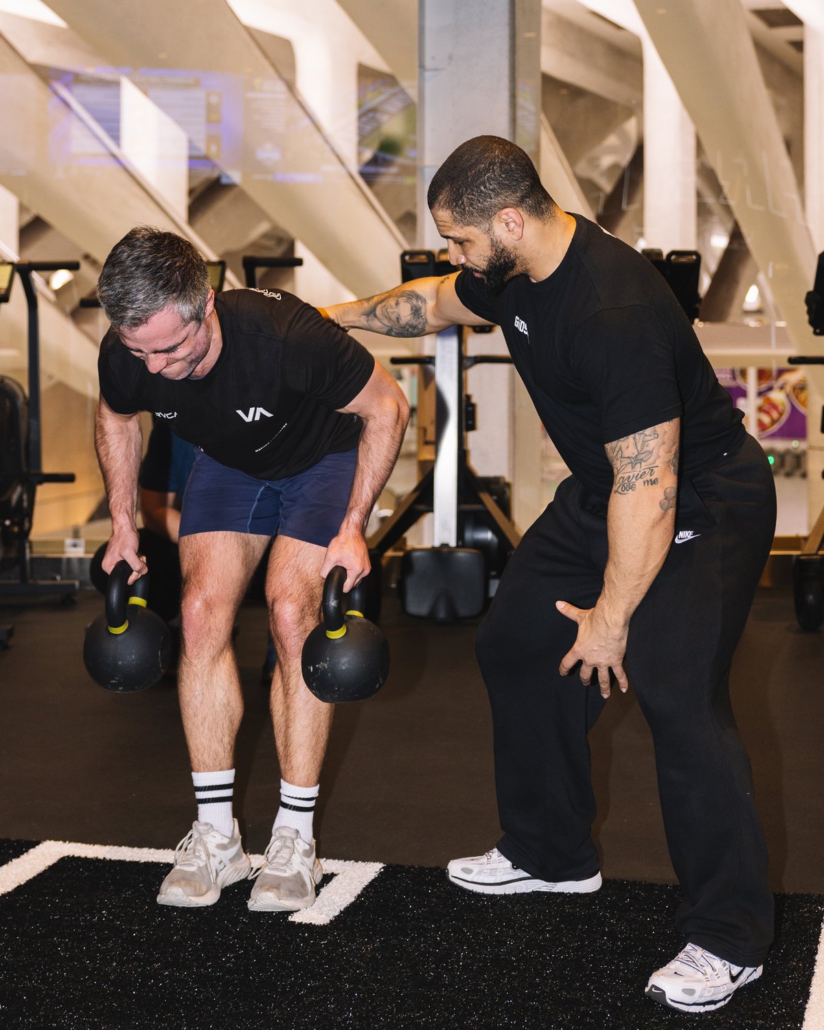 A GUDSPORT coach working one on one with an athlete.