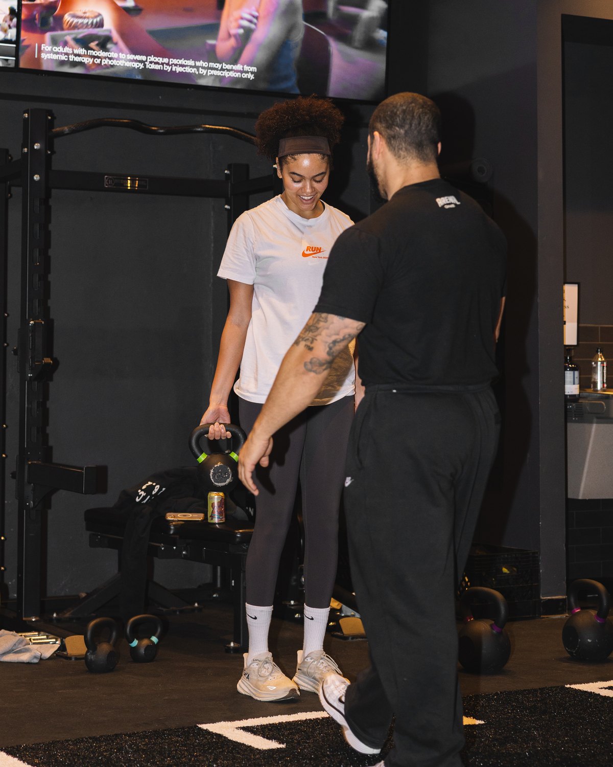 A trainer coaching their own client during the free week.